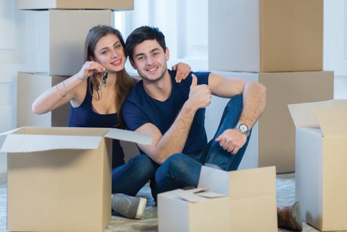 Removal team preparing a Clapham home move with boxes and furniture