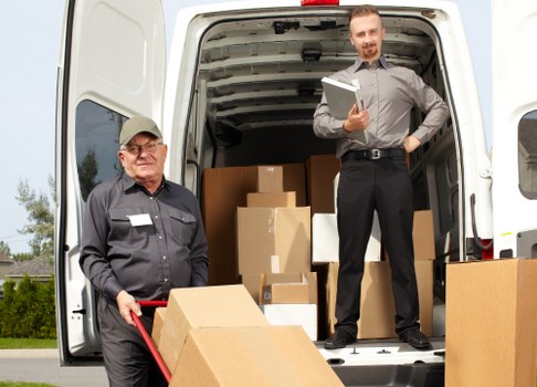 Removal van and recycling boxes during a Clapham clearance