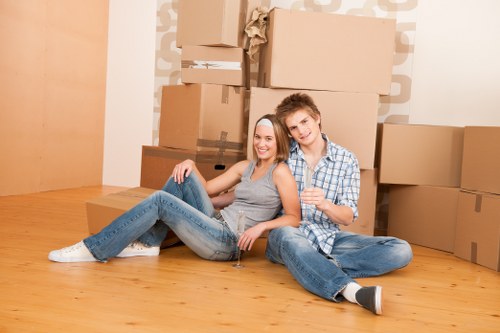 Local movers handling furniture in a Clapham flat