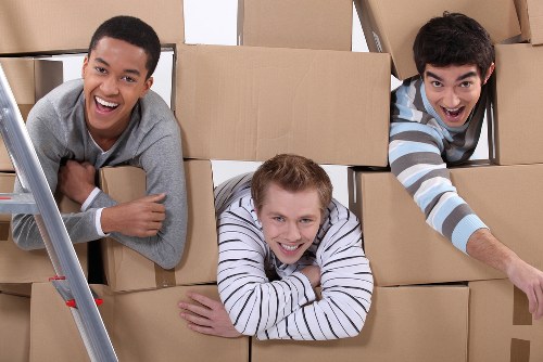 Local team collecting sofas and chairs from a flat in Clapham