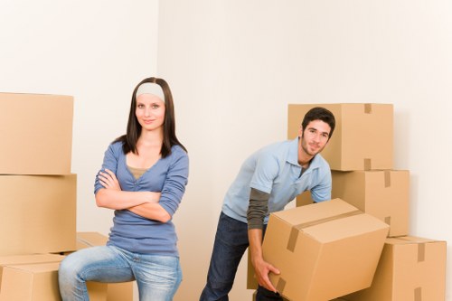 Prepared moving boxes and furniture ready for a van collection in Clapham