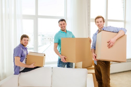 Loading boxes and furniture into a hired removal truck