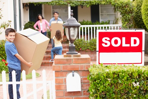 Professional movers handling office relocation equipment in Clapham