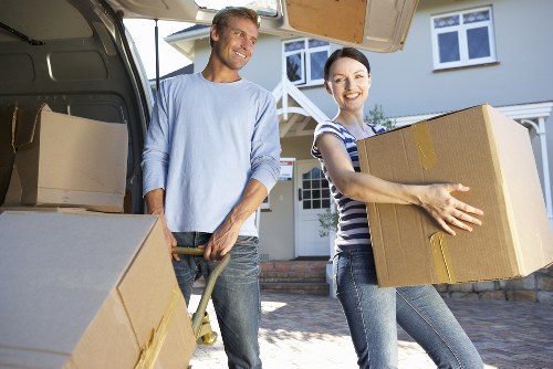 Loading furniture into a local removal van near Clapham Common