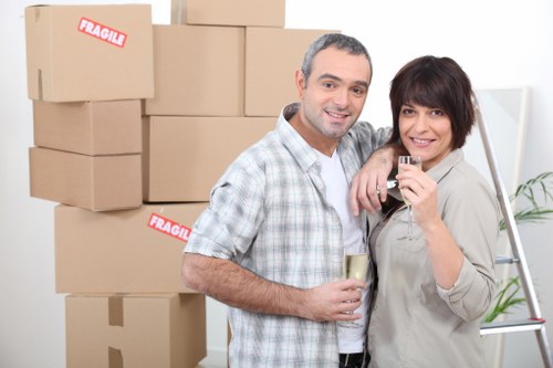 Professional movers handling furniture carefully